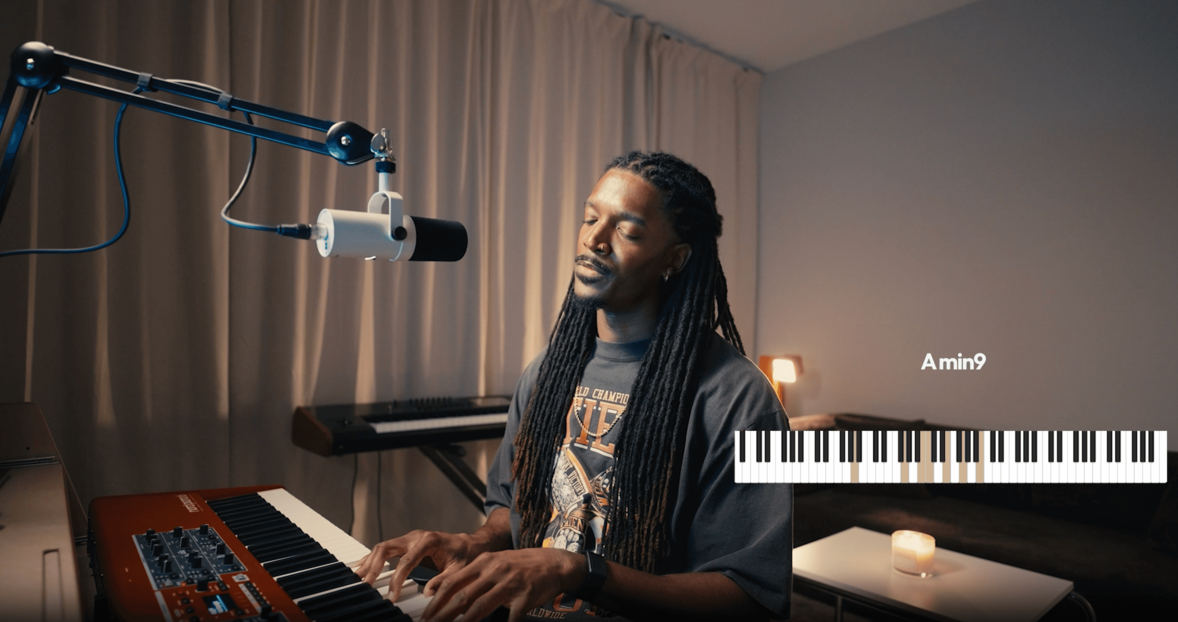 Roger Simon playing keys at a microphone